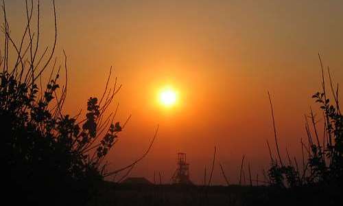 Sunset over Geevor mine head gear